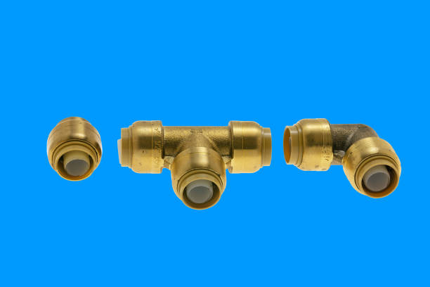 istock Bronze angle fittings for water on a blue  background 1448590859