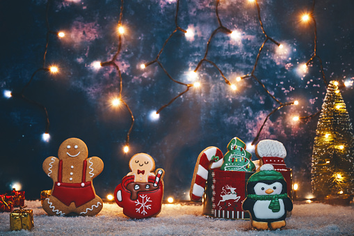 Decorated Gingerbread Christmas Cookies on Christmas Background