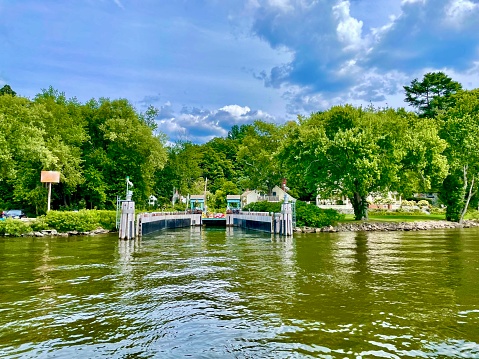 Taken aboard the Chester-Hadlyme Ferry, MV Seldon III. The seasonal ferry crosses the Connecticut River between the town of Chester, Connecticut and the village of Hadlyme (in the town of Lyme, Connecticut). It is the second oldest continuously operating ferry service in the state of Connecticut and is a designated state historical landmark. The ferry is part of the scenic portion of Route 148 and provides a link to Gillette Castle State Park in Hadlyme and the Essex Steam Train, which runs between Essex and Chester. The Connecticut River is 255 miles long, flowing through 26 New Hampshire communities and along 27 Vermont communities before entering Massachusetts, then continuing through Connecticut on its way to Long Island Sound.