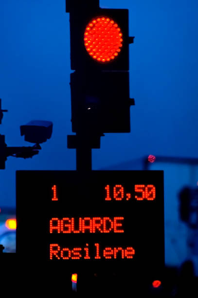 istock Toll sign detail in red light 1448599424