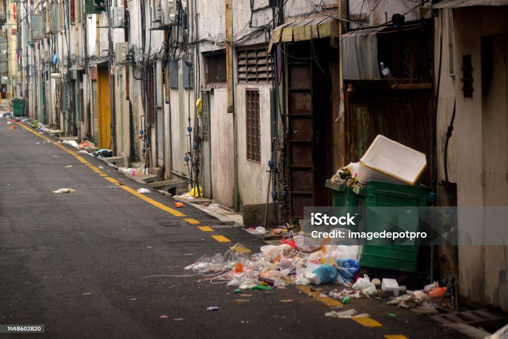 Residential area dirty city street Residential area in Kuala Lumpur, Malaysia Alley Stock Photo