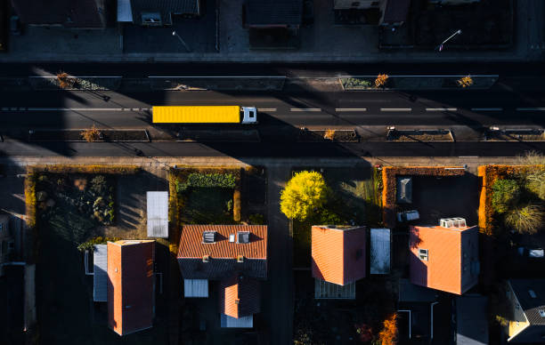 istock Residential district in Odense with yellow truck 1448602885