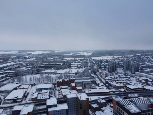istock High angle view of Snow covered landscape and Cityscape, 1448603879