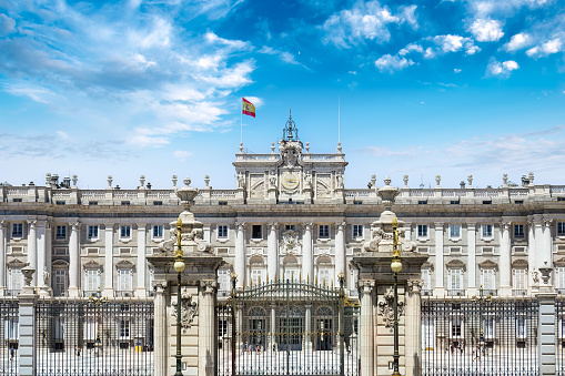 Madrid, Spain - October 23, 2022: Facade of the Royal Palace. The famous place and national landmark is a tourist attraction