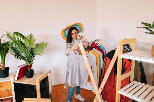 istock Young woman choosing clothes 1448605101