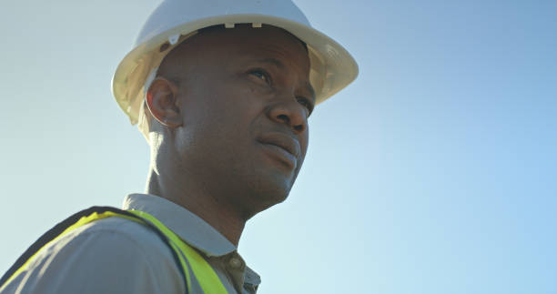 istock Black man, construction worker with helmet and construction mockup, building industry with contractor headshot. Engineer thinking, engineering and safety with developer and professional man working. 1448605728