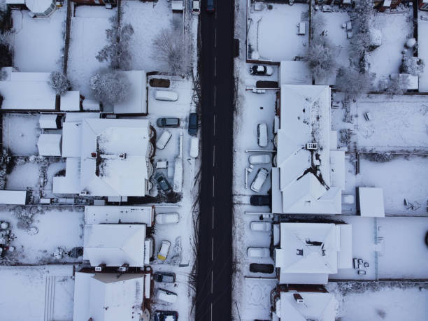 istock High angle view of Snow covered landscape and Cityscape, 1448607052