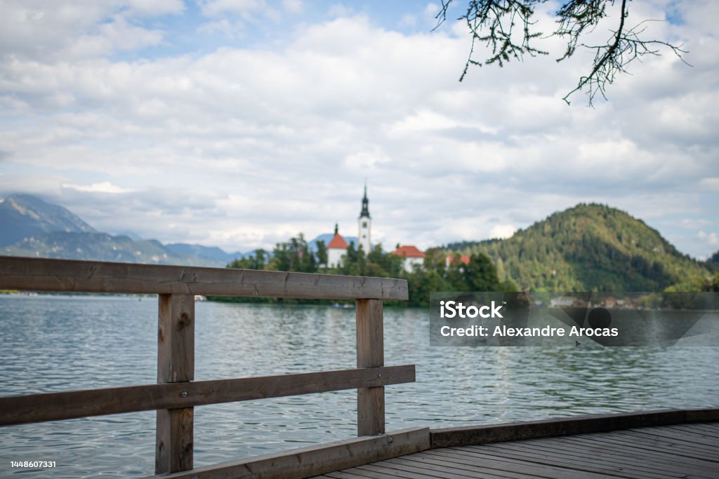 wooden walkway surrounding the lego bled wooden walkway surrounding the lego bled slovenia No People Stock Photo