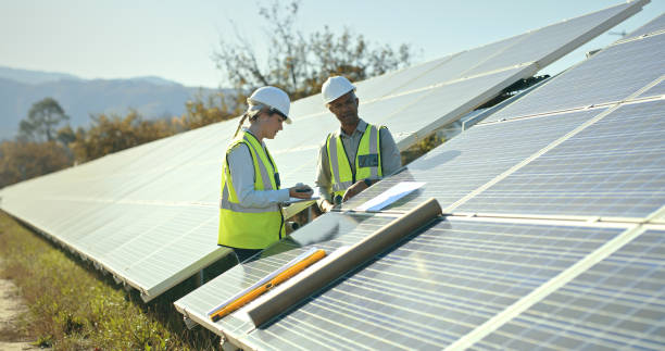 istock Engineering, diversity and team inspection of solar panel, renewable energy or electricity power supply. Sun solar energy, clean energy sustainability or people review blueprint of photovoltaic model 1448607398