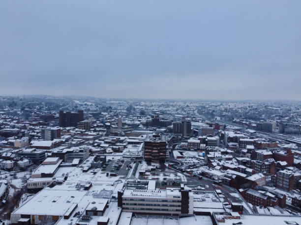 istock High angle view of Snow covered landscape and Cityscape, 1448608162