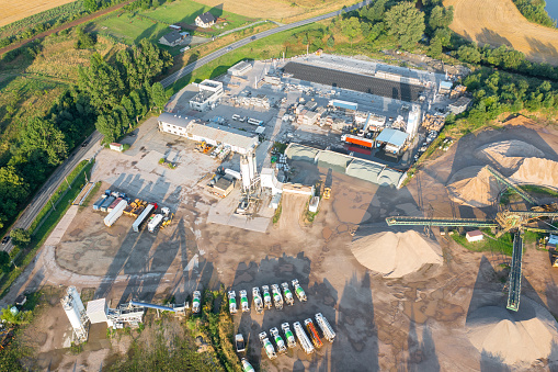 Aerial view of a large plant for the production of concrete, asphalt. sand extraction from a quarry