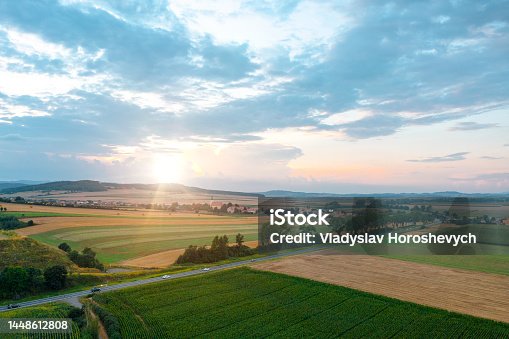 istock Rural scene, sunset in the meadow, summer evening 1448612808