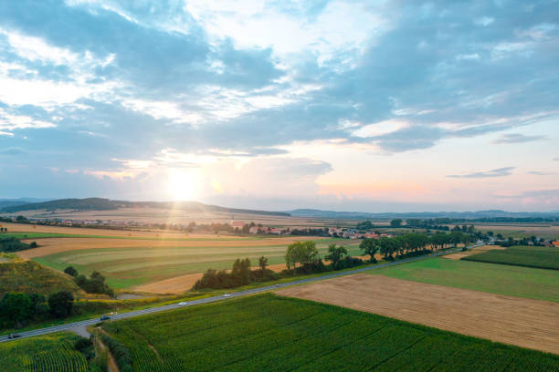 Rural scene, sunset in the meadow, summer evening Rural scene, sunset in the meadow, summer evening farm stock pictures, royalty-free photos & images