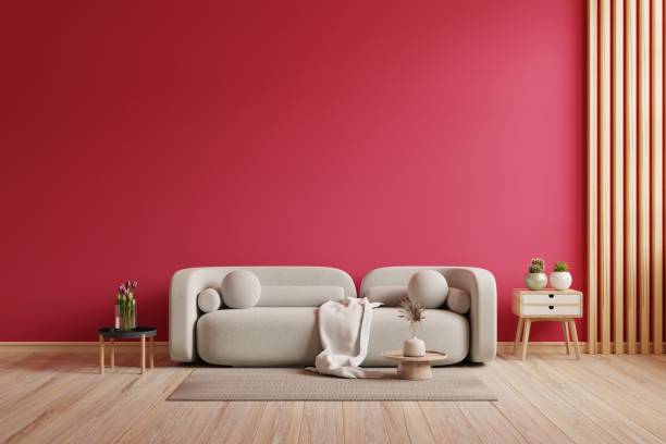 viva 마젠타 색 벽 배경 모형에는 소파 가구와 장식이 있습니다. - viva magenta 뉴스 사진 이미지