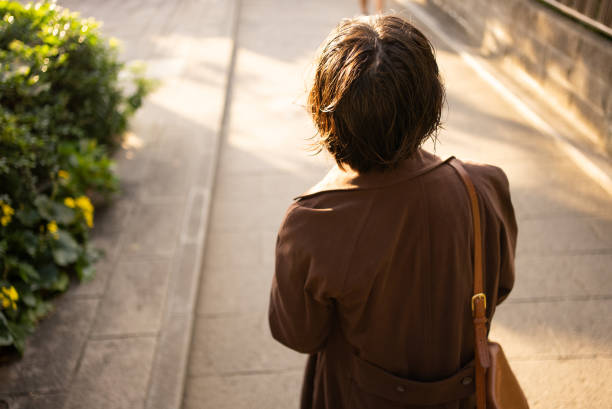 Asian woman sightseeing in Japan.Strolling through an old Japanese town.