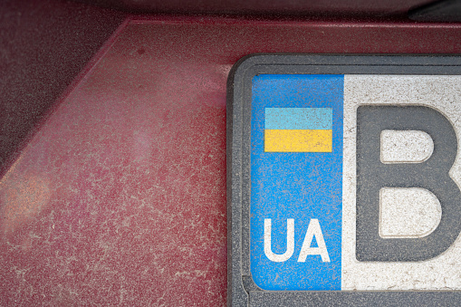 part of a license plate with the Ukrainian flag