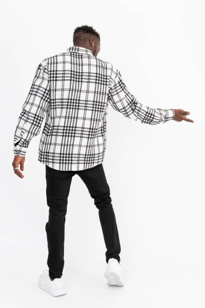istock Black man wearing winter shirt against white background. 1448632103