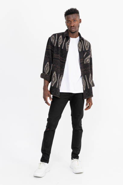 istock Black man wearing winter shirt against white background. 1448632195