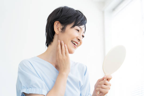 istock Woman looking in the mirror 1448633234
