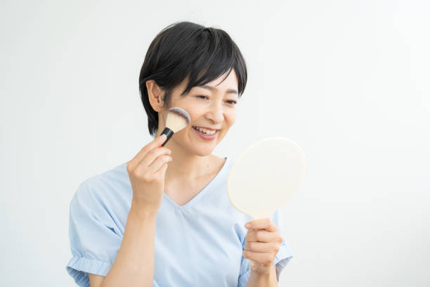 istock Woman looking in the mirror 1448633242