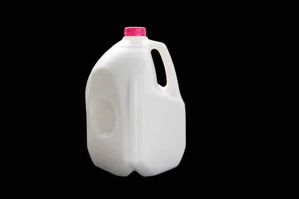 A 4 Litres milk jug on a black background
