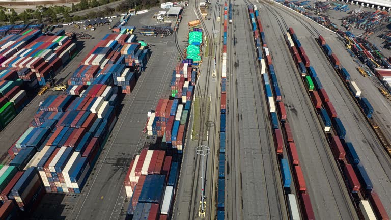 Freight Train Being Loaded with Containers in Port of LA - Aerial Hyper Lapse