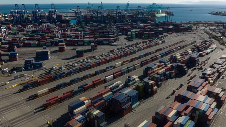 Upward Tilting Drone Shot of Container Terminal in Port of LA - Hyper Lapse