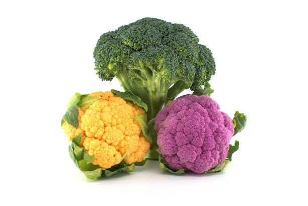 istock Fresh colorful cauliflowers and broccoli on white 1448645007