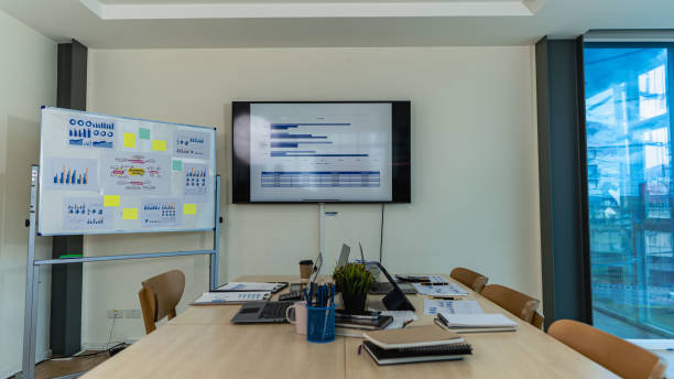 istock Business finance office concept on table with laptop computer and graph document calculator 1448645121
