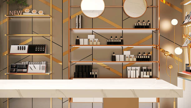 Empty white marble counter in elegant and luxury interior design of beauty cosmetic shop with gold steel shelf and personal, skin and hair care product and decorative glass backdrop partition Empty white marble counter in elegant and luxury interior design of beauty cosmetic shop with gold steel shelf and personal, skin and hair care product and decorative glass backdrop partition for product display background salon mirror stock pictures, royalty-free photos & images