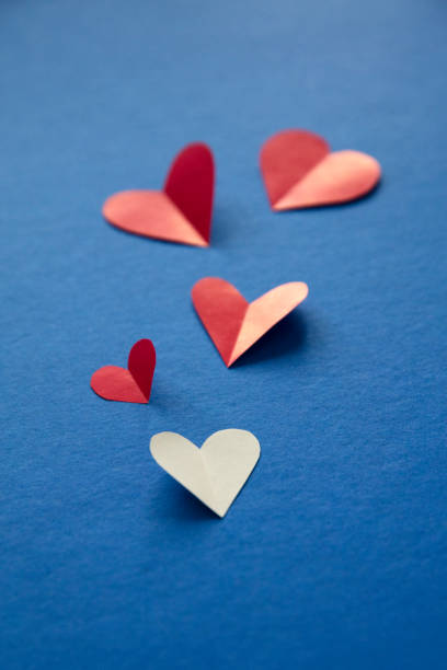 istock Red and blue paper Background with Hearts multicolored Pattern 1448657519