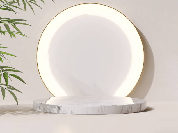 istock White marble podium stage with round spotlight backlight, tree on beige counter and wall in dappled sunlight, leaf shadow 1448669071