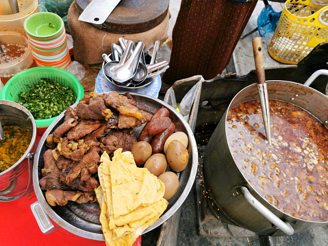 Cambodian street food. Cooked meat dish with beef stew in a restaurant at the market in Phnom Penh, Cambodia.