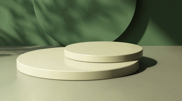 istock High angle of two layer green round glossy podium with dappled sunlight, leaf shadow on matte dark green abstract wall with space in background 1448679413