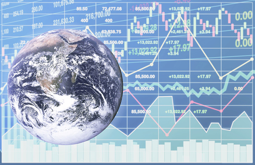 Global economics view with graph, chart, candlesticks and number of stock data symbol for business background.Earth image https://www.nasa.gov/content/blue-marble-image-of-the-earth-from-apollo-17