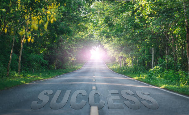 istock Road that says success in the asphalt 1448679549