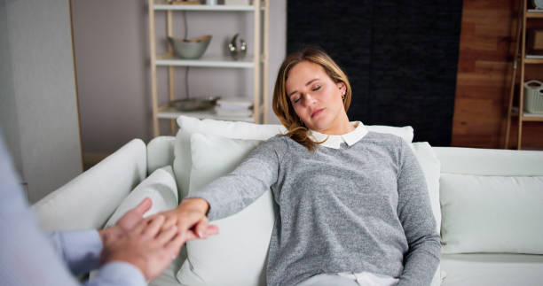 istock Hypnotherapy Psychotherapy Treatment. Woman Hypnotized 1448682628