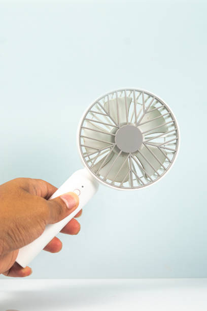 istock small portable fan with white background 1448692706