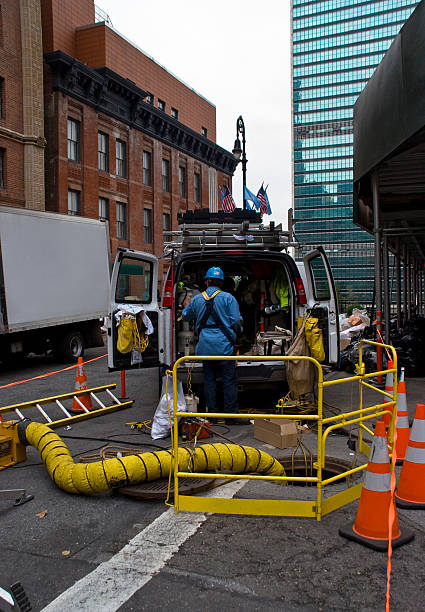 istock City construction workers repairing roads 144869299