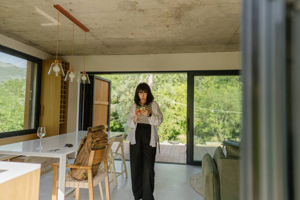 istock Young woman using mobile phone 1448695971