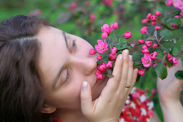 istock Girl with pink flowers 144869608