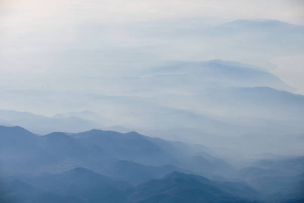 istock Clouds And Misty Mountains, Blue Tones 1448697204