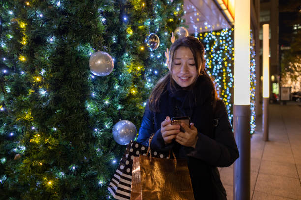 istock Woman waiting for someone at Christmas night 1448698193