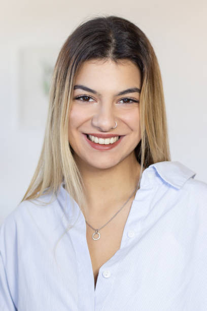 istock Smiling Hispanic student in shirt 1448698299