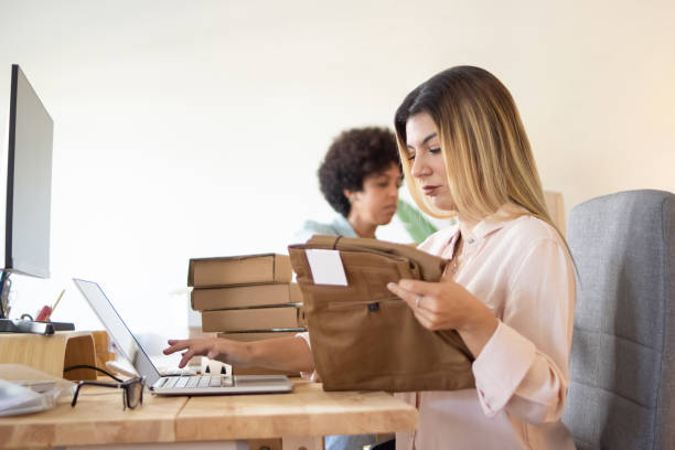 istock Serious woman examining order number 1448698308