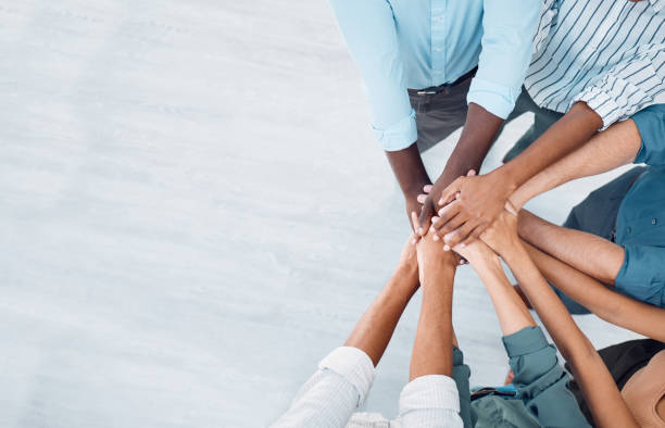 istock Teamwork, motivation and diversity hands stacked with mock up corporate marketing or advertising space. Group support, community or staff team building for project goal, solidarity and collaboration 1448698677