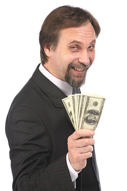 istock businessman  with money 144869966
