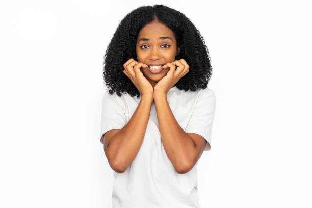 istock Anxious multiracial woman biting nails 1448705581