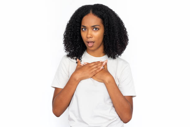 istock Amazed multiracial woman pressing hands to chest 1448705584