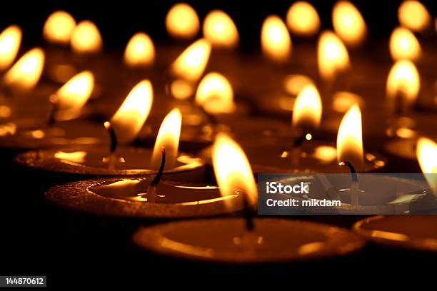 Lots Of Lit Candles In The Dark Stock Photo - Download Image Now - Backgrounds, Black Color, Burning